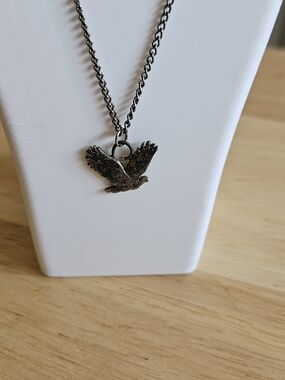 Bird Pendant Necklace Cut From A Quarter in Dark Silver.  16" Chain